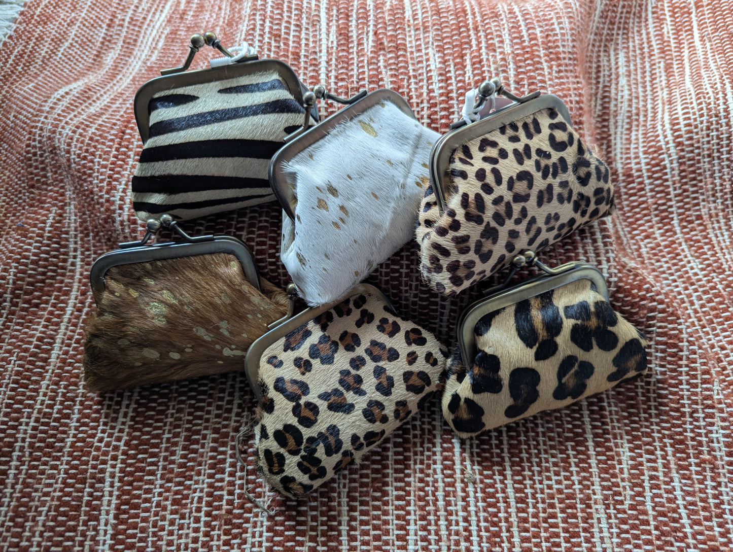Ethically sourced animal hide kisslock coin purse
