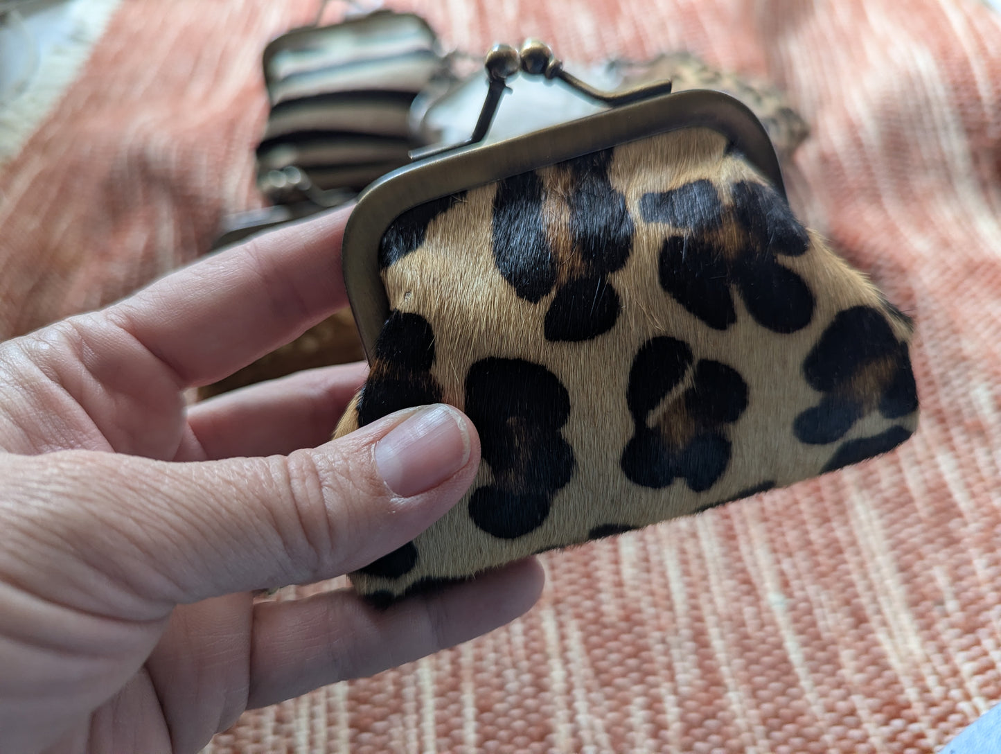 Ethically sourced animal hide kisslock coin purse