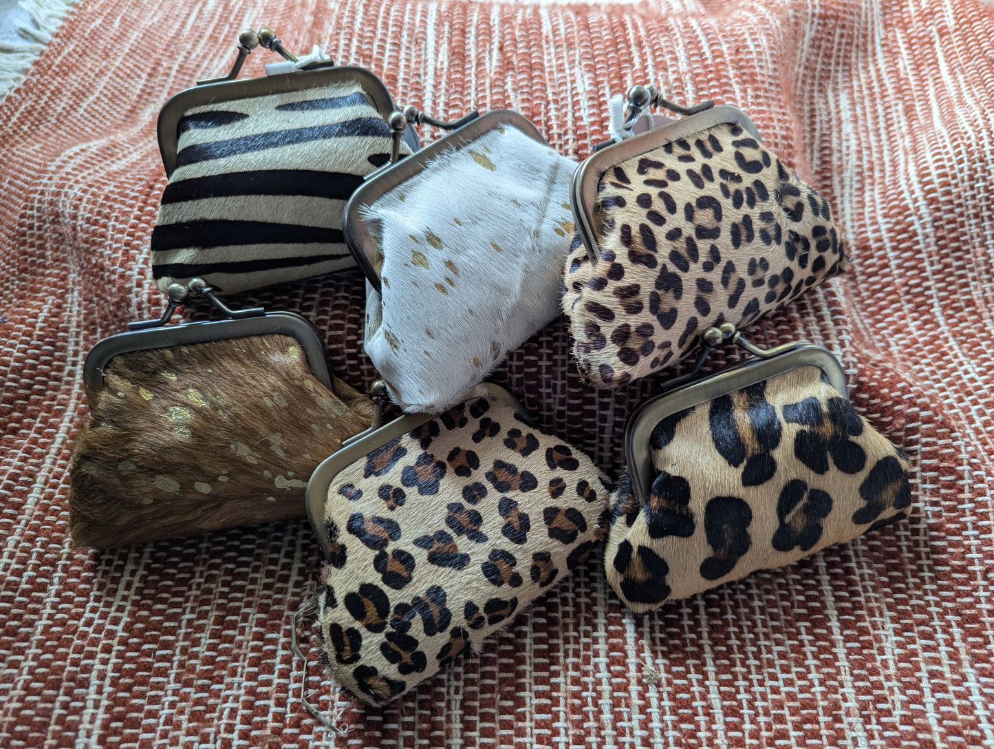 Ethically sourced animal hide kisslock coin purse