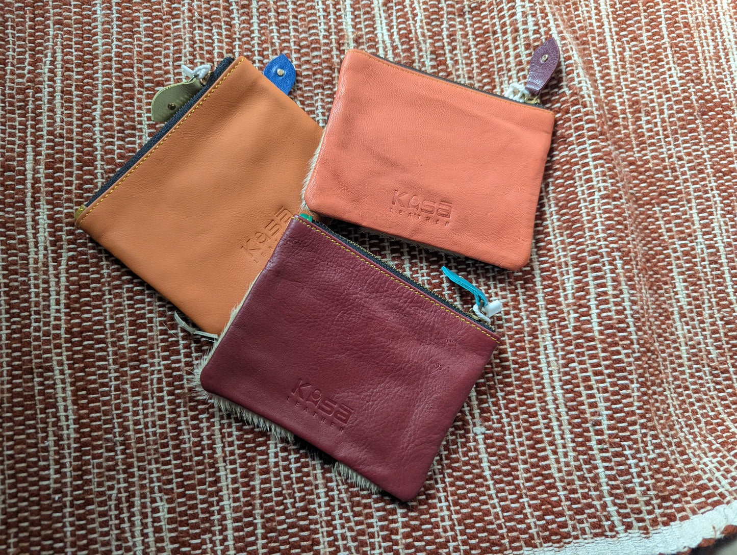 Cowhide and leather coin purse